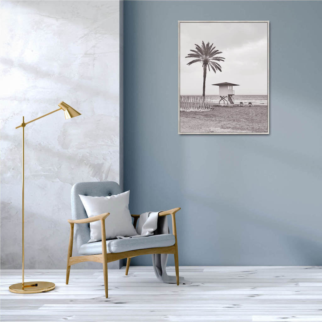 Transform your space with the calming coastal vibes of our Life Guard Framed Canvas. This gorgeous relaxed and neutral piece will bring style to any space and is an easy way to update your home decor. Finished with a natural timber look frame. 80 x 100cm. | Bliss Gifts &amp; Homewares | Unit 8, 259 Princes Hwy Ulladulla | South Coast NSW | Online Retail Gift &amp; Homeware Shopping | 0427795959, 44541523