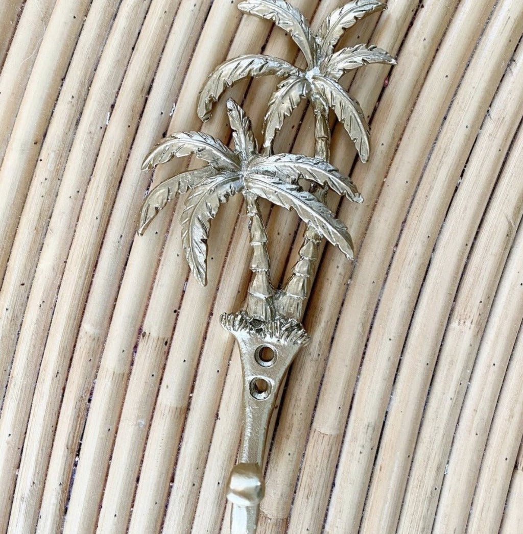 Our Islander Palm Tree Wall Hook has two brass swaying palm trees and a single hook. This little beauty is great to hang your keys, hat or towels. Our Islander Palm Tree Wall Hook comes with screws ready to hang. Add a touch of the tropics to your decor.| Bliss Gifts &amp; Homewares | Unit 8, 259 Princes Hwy Ulladulla | South Coast NSW | Online Retail Gift &amp; Homeware Shopping | 0427795959, 44541523