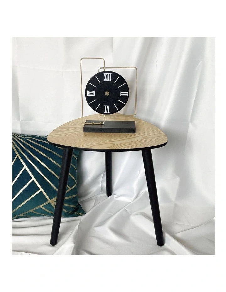 Modern sculptural side table with unique three-leg design