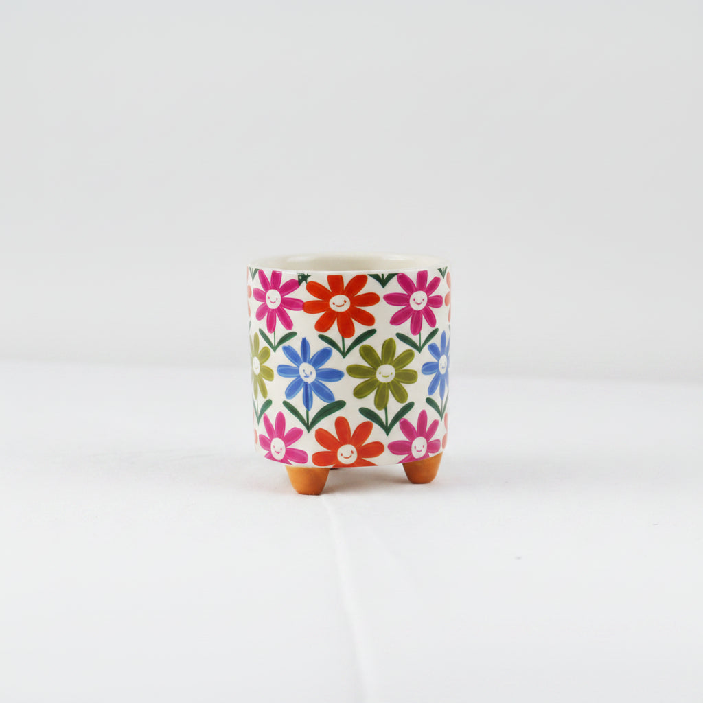 small ceramic pot with flower print