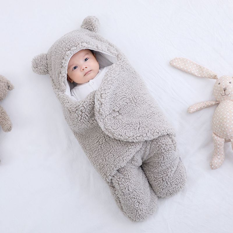 Soft light grey baby blanket, ideal for swaddling newborns.