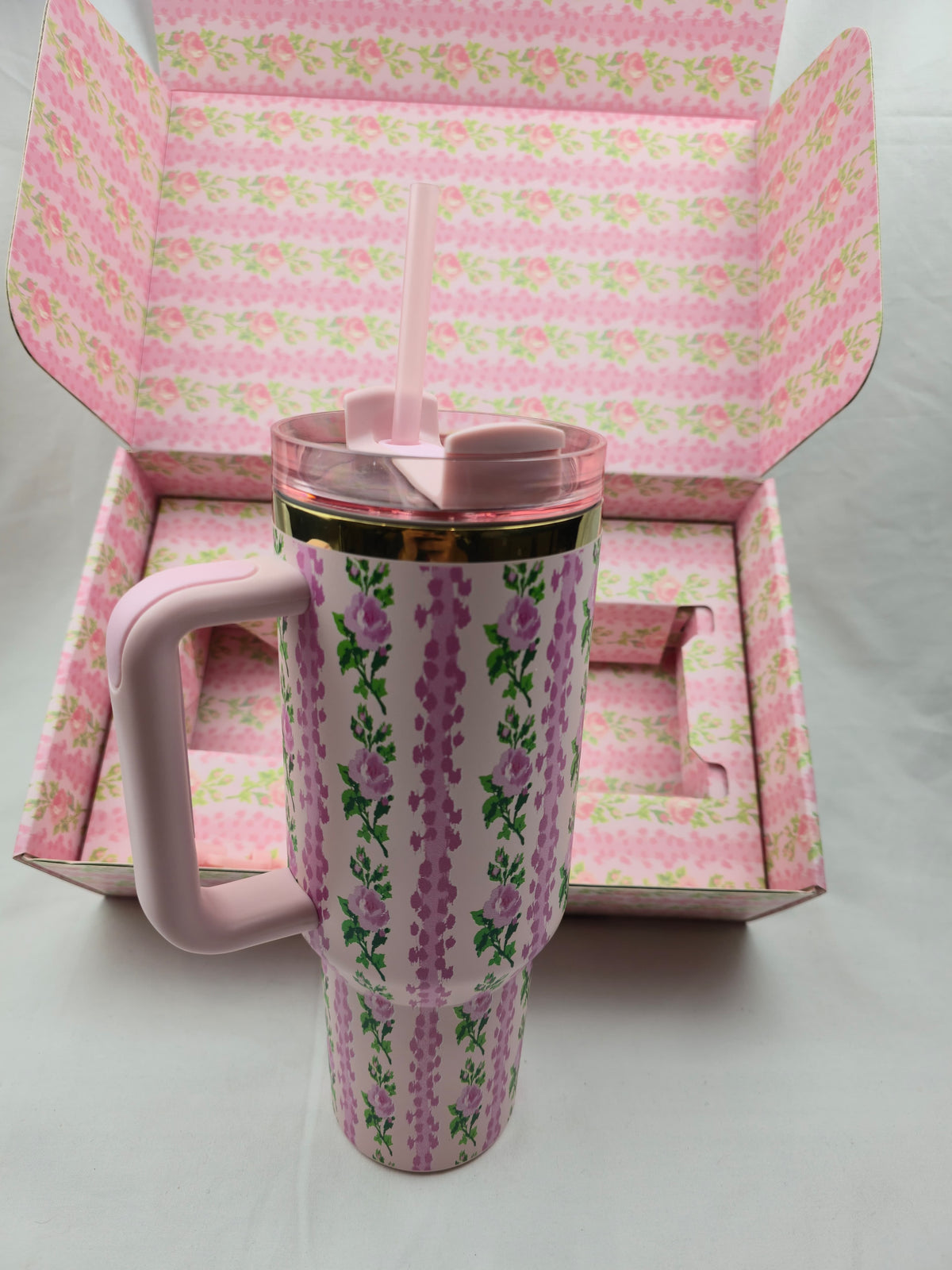Pink floral-patterned tumbler 
