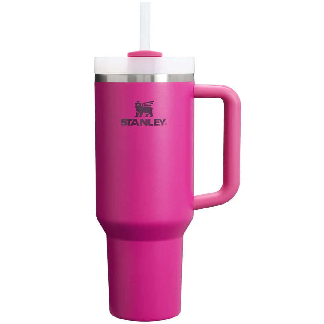 A pink Stanley Quencher H2.0 Flow State Tumbler 40oz Cup with straw entrance and a full-cover top.