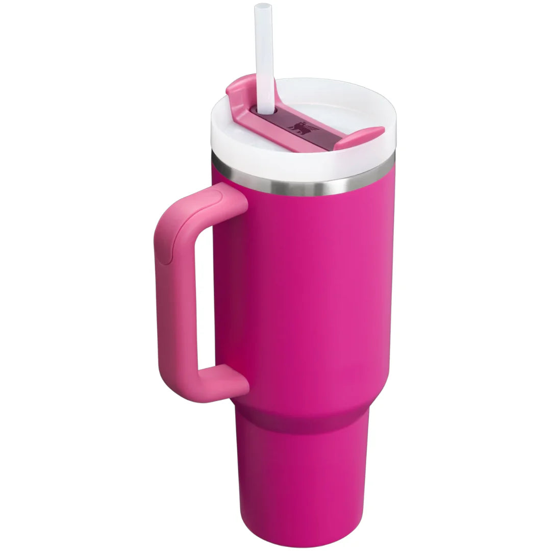 A pink Stanley Quencher H2.0 Flow State Tumbler 40oz Cup with straw entrance and a full-cover top.