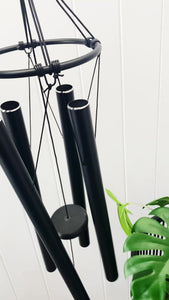 Our bold and beautiful Black Metal Harmonious Tuned Wind Chime features 5 large tubes in all different sizes to give different sounds to your outdoor space. With a strong hook at the top, this stunning wind chime gives off beautiful sound an energy. 85cm.| Bliss Gifts & Homewares | Unit 8, 259 Princes Hwy Ulladulla | South Coast NSW | Online Retail Gift & Homeware Shopping | 0427795959, 44541523