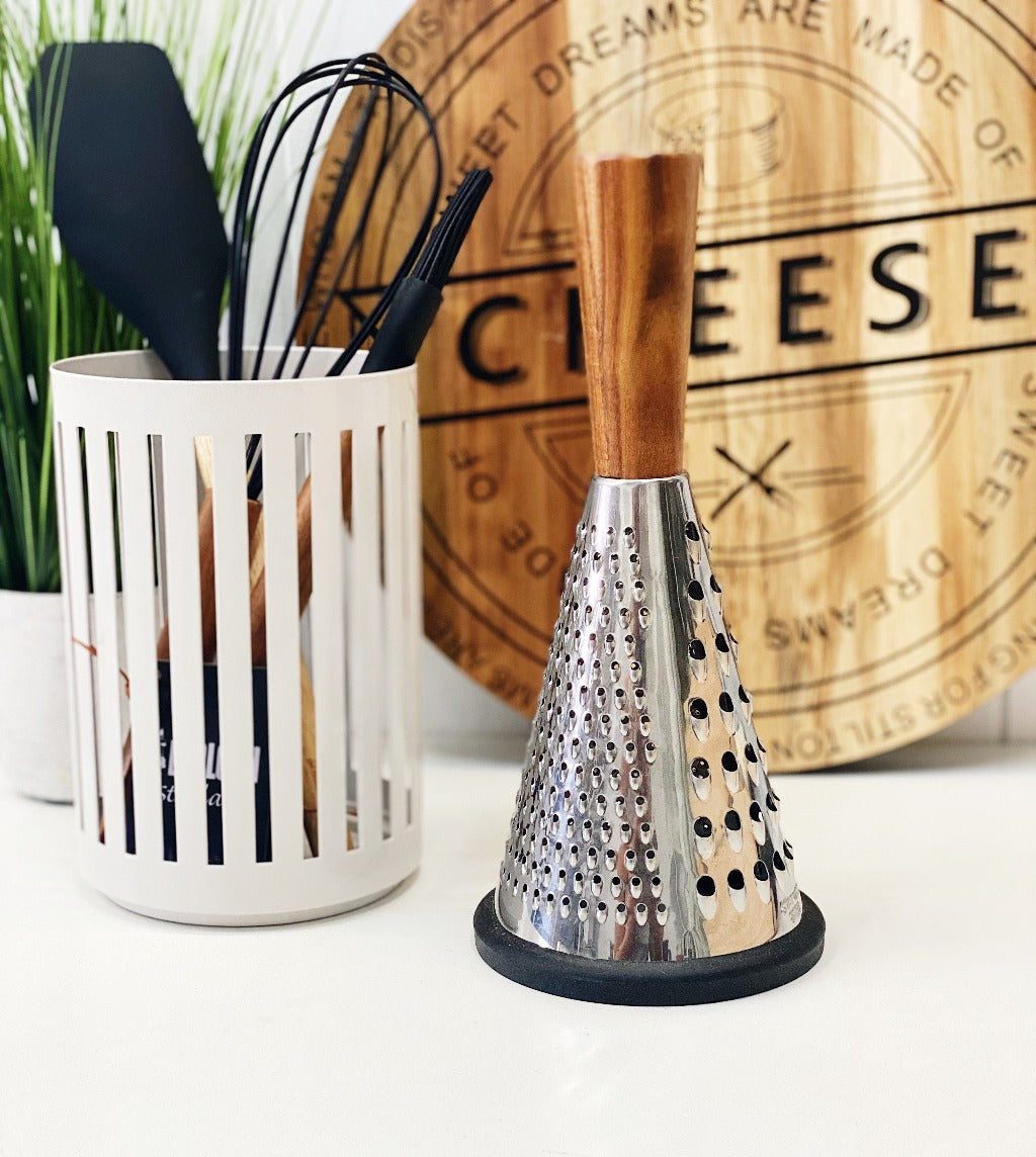 Make a statement in your kitchen with our Acacia and Stainless Steel Grater. A high quality Stainless Steel Grater that is both functional and beautiful with an Acacia wood handle. Non slip silicone base. 26cm. Shop online. | Bliss Gifts &amp; Homewares | Unit 8, 259 Princes Hwy Ulladulla | South Coast NSW | Online Retail Gift &amp; Homeware Shopping | 0427795959, 44541523 