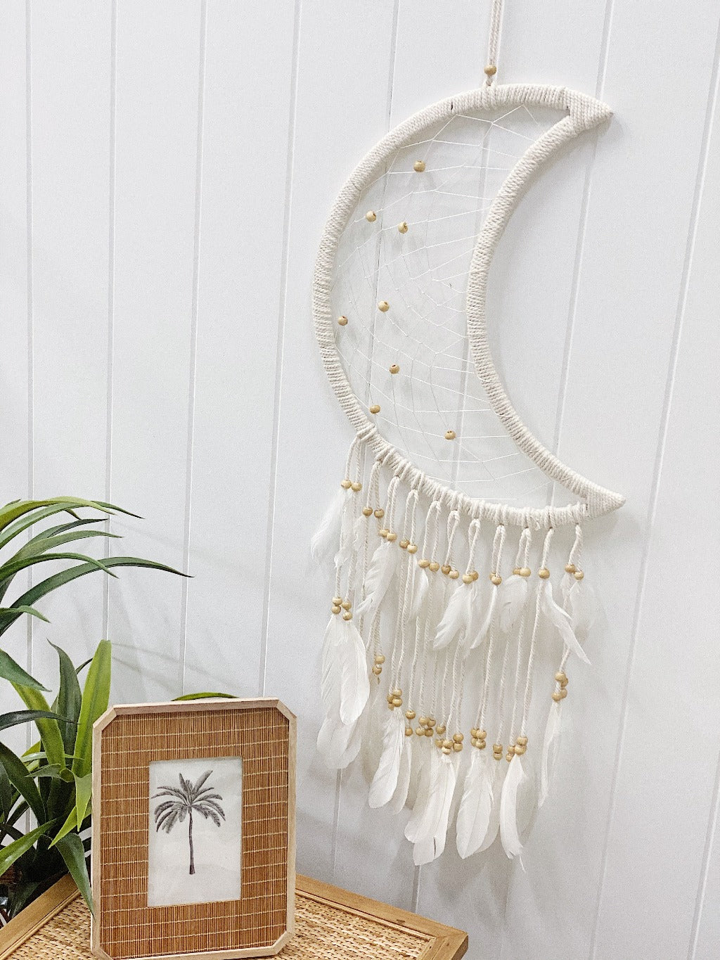 Encourage peaceful nights by placing our beautiful Beaded Moon Dream Catcher in a nursery or child&#39;s room, or even just to add some bohemian style to your home. Features beaded tassels and beaded weave in the moon shape. Hangs 97cm.| Bliss Gifts &amp; Homewares | Unit 8, 259 Princes Hwy Ulladulla | South Coast NSW | Online Retail Gift &amp; Homeware Shopping | 0427795959, 44541523