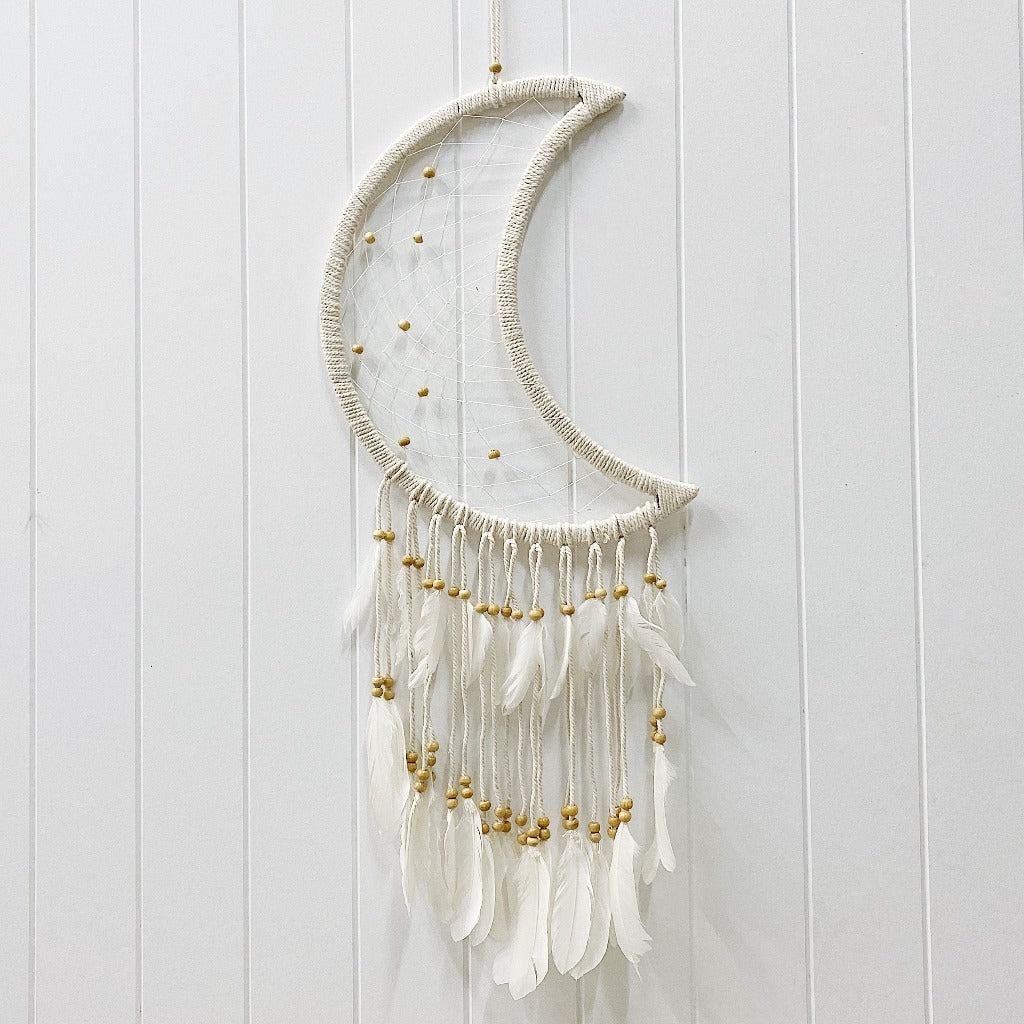 Encourage peaceful nights by placing our beautiful Beaded Moon Dream Catcher in a nursery or child&#39;s room, or even just to add some bohemian style to your home. Features beaded tassels and beaded weave in the moon shape. Hangs 97cm.| Bliss Gifts &amp; Homewares | Unit 8, 259 Princes Hwy Ulladulla | South Coast NSW | Online Retail Gift &amp; Homeware Shopping | 0427795959, 44541523