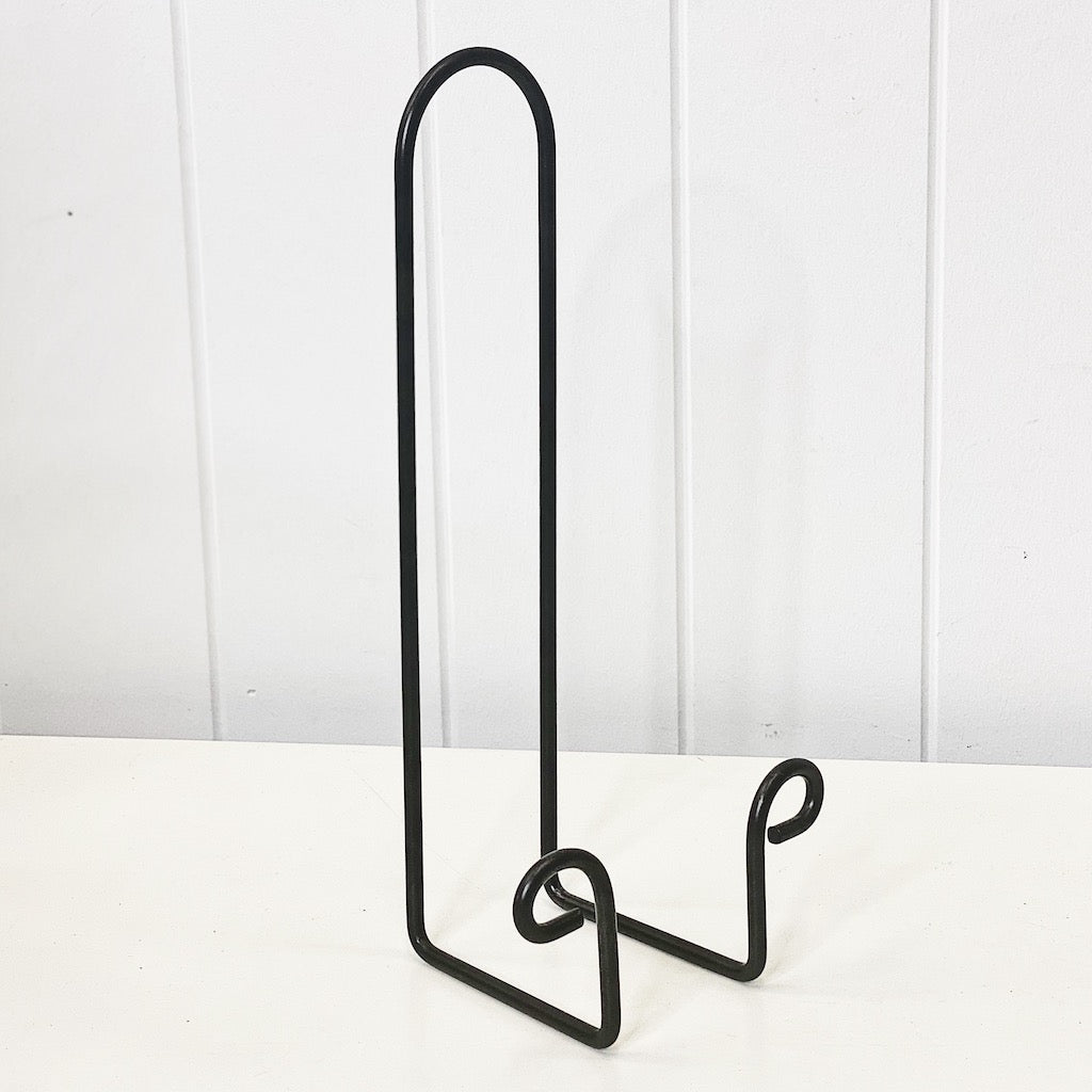 Display your favourite cook books, books and plates with our sturdy black metal Book or Plate Display Stand - Large. Perfect for making your favourite plates a statement piece in your home or keeping your faviourite recipe handy while cooking. Shop Online & In-store. AfterPay Available. Australia Wide Shipping | Bliss Gifts & Homewares - Unit 8, 259 Princes Hwy Ulladulla - 0427795959, 44541523 