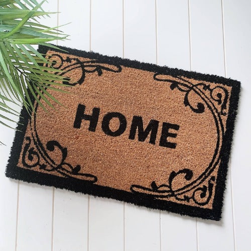 Our gorgeous Filigree Home Door Mat is the perfect way to create a luxe feel to your home before your guests even step foot inside. - 60 x 40cm - Black &quot;Home&quot; sign surrounded by a beautiful black filigree design on a natural background - Made from Natural coir fibres - PVC backing | Bliss Gifts &amp; Homewares | Unit 8, 259 Princes Hwy Ulladulla | South Coast NSW | Online Retail Gift &amp; Homeware Shopping | 0427795959, 44541523