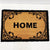 Our gorgeous Filigree Home Door Mat is the perfect way to create a luxe feel to your home before your guests even step foot inside. - 60 x 40cm - Black "Home" sign surrounded by a beautiful black filigree design on a natural background - Made from Natural coir fibres - PVC backing | Bliss Gifts & Homewares | Unit 8, 259 Princes Hwy Ulladulla | South Coast NSW | Online Retail Gift & Homeware Shopping | 0427795959, 44541523