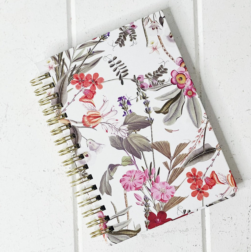 These gorgeous Floral Deluxe Spiral Notebook - A6 are a perfect gift for your loved ones or for yourself, if you love to handwrite your notes. Each notebook features a unique background colour with gorgeous gold foiled flowers on the front. 80 sheets.| Bliss Gifts &amp; Homewares | Unit 8, 259 Princes Hwy Ulladulla | South Coast NSW | Online Retail Gift &amp; Homeware Shopping | 0427795959, 44541523