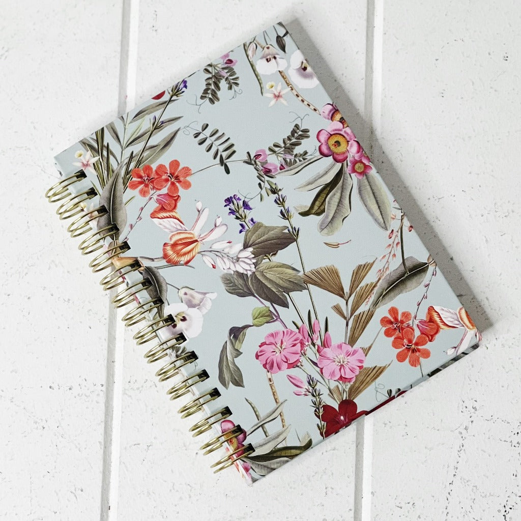 These gorgeous Floral Deluxe Spiral Notebook - A6 are a perfect gift for your loved ones or for yourself, if you love to handwrite your notes. Each notebook features a unique background colour with gorgeous gold foiled flowers on the front. 80 sheets.| Bliss Gifts &amp; Homewares | Unit 8, 259 Princes Hwy Ulladulla | South Coast NSW | Online Retail Gift &amp; Homeware Shopping | 0427795959, 44541523