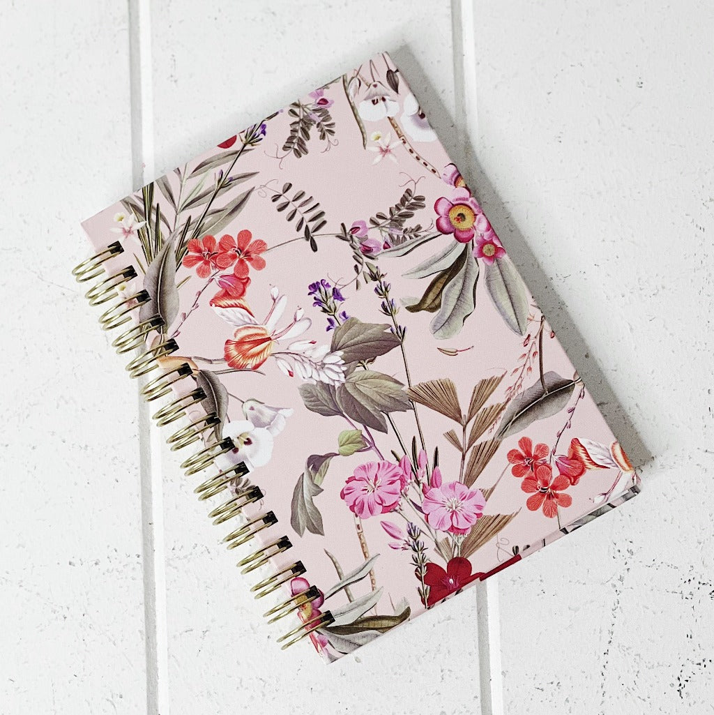 These gorgeous Floral Deluxe Spiral Notebook - A6 are a perfect gift for your loved ones or for yourself, if you love to handwrite your notes. Each notebook features a unique background colour with gorgeous gold foiled flowers on the front. 80 sheets.| Bliss Gifts &amp; Homewares | Unit 8, 259 Princes Hwy Ulladulla | South Coast NSW | Online Retail Gift &amp; Homeware Shopping | 0427795959, 44541523