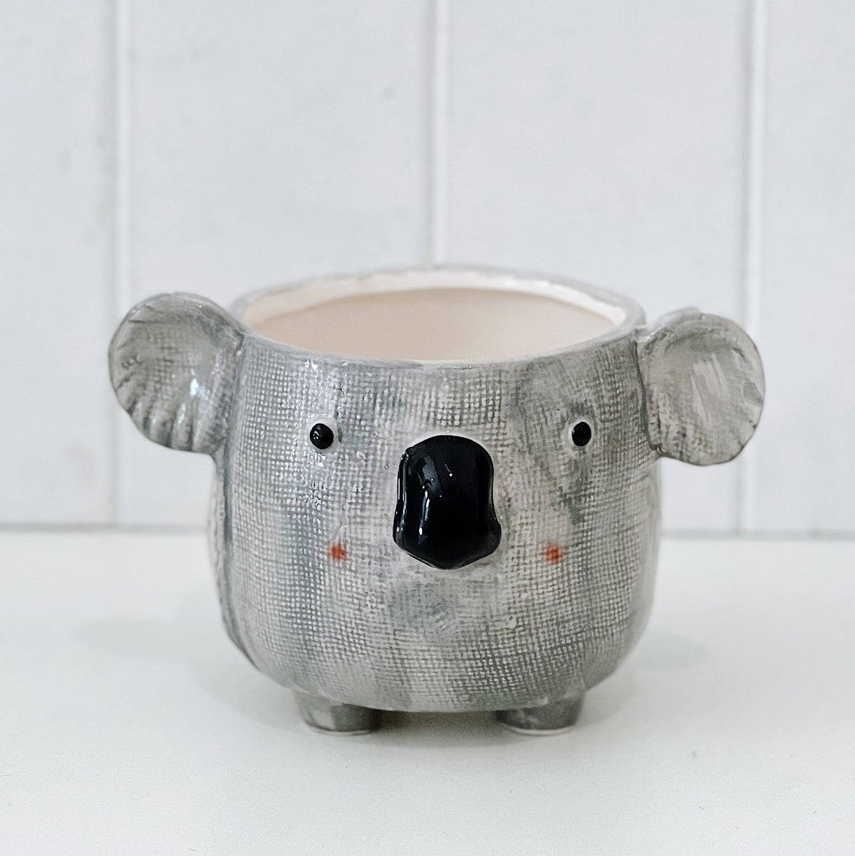 Add some fun to your garden with our Kai Koala Ceramic Pot. This gorgeous pot is fun, colourful and a great addition to any home or garden. 17.5x14.2x12cm. Ceramic, drainage hole and plug. | Bliss Gifts &amp; Homewares | Unit 8, 259 Princes Hwy Ulladulla | South Coast NSW | Online Retail Gift &amp; Homeware Shopping | 0427795959, 44541523.