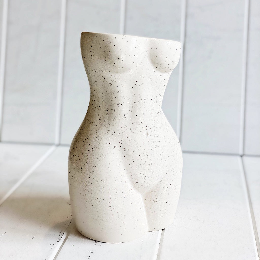Embrace feminine curves and your love of greenery in your home or garden with our contemporary style Kim Body Vase/Planter. This on-trend vase could also be used for a pot or planter. Cement speckle look 13x9.7x21.5cm. Shop online. AfterPay available. Australia wide Shipping | Bliss Gifts &amp; Homewares - Unit 8, 259 Princes Hwy Ulladulla - 0427795959, 44541523 