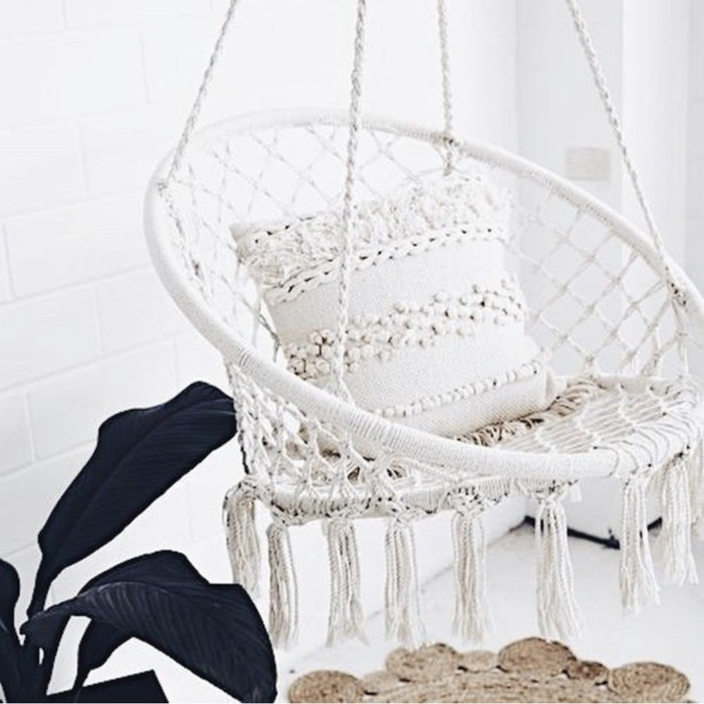 Relax and unwind in this gorgeous Macrame Boho Hanging Chair. This beautiful hanging chair has sturdy structure and has been adorned with stylish macrame and tassels and will add style and boho vibes to any space. This versatile chair can be used inside or outside.| Bliss Gifts & Homewares | Unit 8, 259 Princes Hwy Ulladulla | South Coast NSW | Online Retail Gift & Homeware Shopping | 0427795959, 44541523