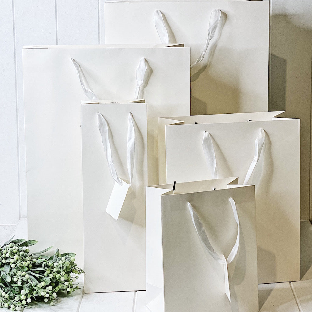 Give your loved ones a gift with our Matte White Gift Bag in Jumbo. Available in multiple sizes to fit your gift perfectly. 35x53x14cm.| Bliss Gifts & Homewares | Unit 8, 259 Princes Hwy Ulladulla | South Coast NSW | Online Retail Gift & Homeware Shopping | 0427795959, 44541523