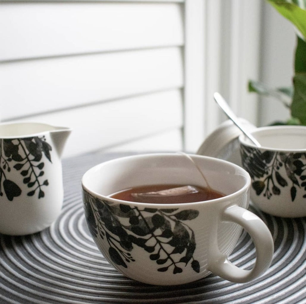 Designed to create a sophisticated affair is this NERI breakfast cup from Salt&Pepper. Inspired by walks through sunlit forests, this lightweight and fine-bodied 400ml cup features delicate silhouettes of leaves and foliage, creating an elegant yet modern effect.| Bliss Gifts & Homewares | Unit 8, 259 Princes Hwy Ulladulla | South Coast NSW | Online Retail Gift & Homeware Shopping | 0427795959, 44541523