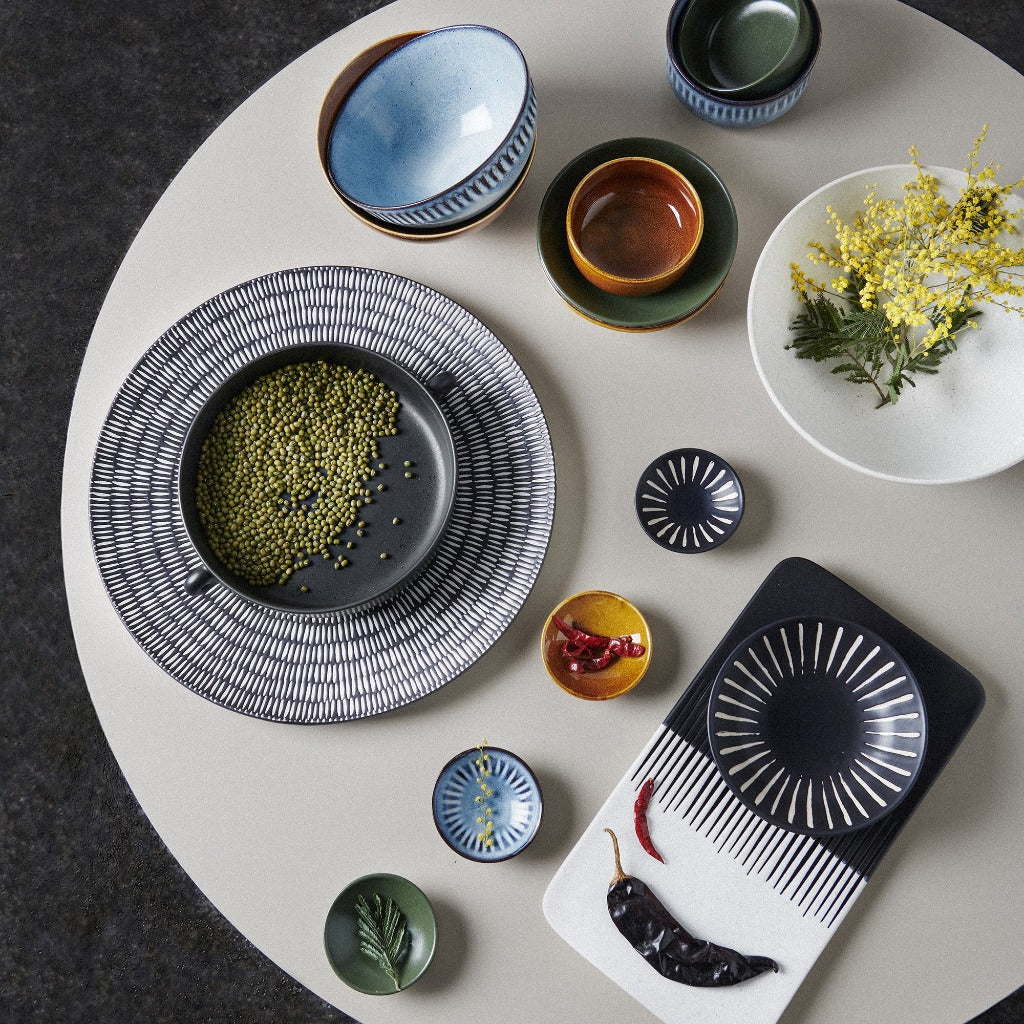 Your dinner table spread is about to go from fine to photogenic with our collection of 4 Osaka bowls. Each stoneware bowl is uniquely textured and coloured, finished with a hand applied reactive glaze that ensures each piece is beautifully unique.| Bliss Gifts &amp; Homewares | Unit 8, 259 Princes Hwy Ulladulla | South Coast NSW | Online Retail Gift &amp; Homeware Shopping | 0427795959, 44541523