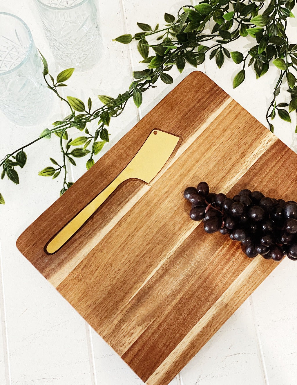 Elevate that sneaky after-work cheese and bickies with our Provedore serving board with cheese knife. Made from classic Acacia wood and complete with a gold cheese knife, our Provedore oval serving board makes any spread feel just a little bit more indulgent.| Bliss Gifts &amp; Homewares | Unit 8, 259 Princes Hwy Ulladulla | South Coast NSW | Online Retail Gift &amp; Homeware Shopping | 0427795959, 44541523