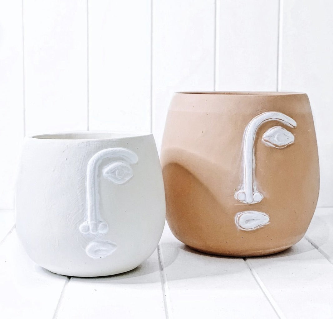 How quirky are our new Pablo Pots in White. The minimal concrete face planters with white detailing come with a drainage hole and plug for you convenience. Measures: 17x15cm. Material: Cement.| Bliss Gifts &amp; Homewares | Unit 8, 259 Princes Hwy Ulladulla | South Coast NSW | Online Retail Gift &amp; Homeware Shopping | 0427795959, 44541523
