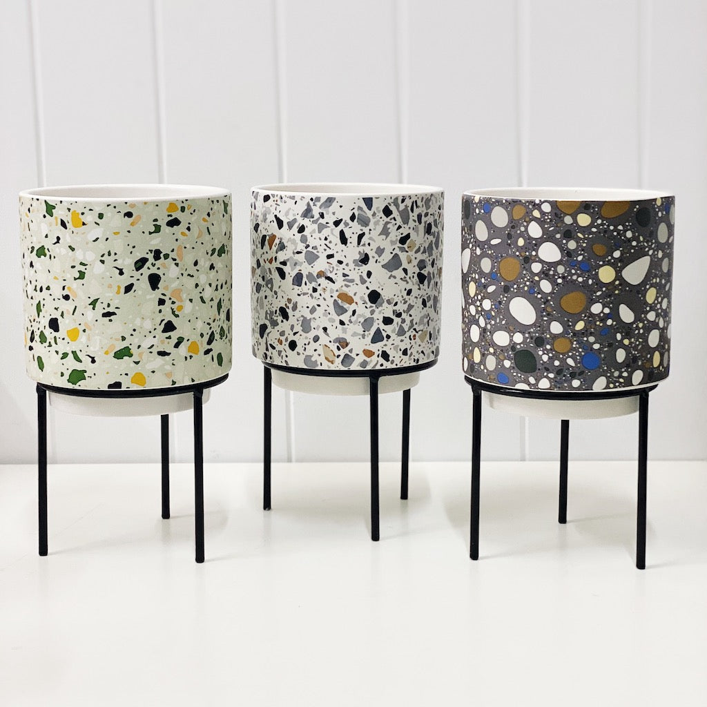 Showcase your favourite plants, succulents, and flowers with the beautiful and unique Terrazzo Pots on Stand in Small. Approx size: 14x14x14.3cm. Ceramic. Drainage hole and plug for your convenience. Shop Online &amp; In-store. AfterPay Available. Australia Wide Shipping | Bliss Gifts &amp; Homewares | Unit 8, 259 Princes Hwy Ulladulla | South Coast NSW | 0427795959, 44541523