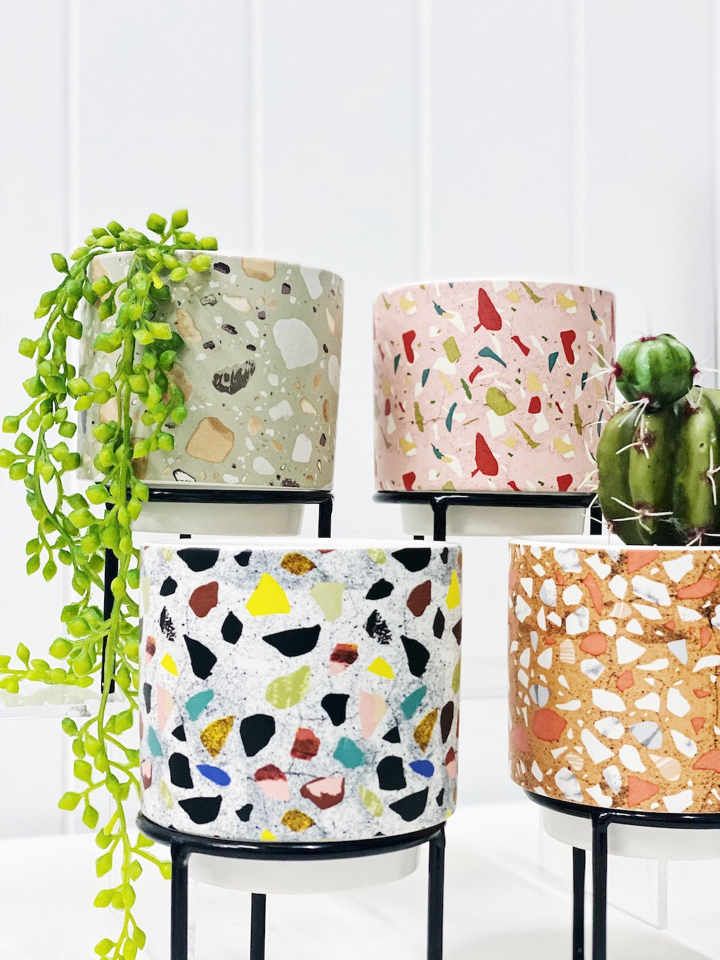 Showcase your favourite plants, succulents, and flowers with the beautiful and unique Terrazzo Pots on Stand in Small. Approx size: 10x10x10cm. Ceramic. Drainage hole and plug for your convenience.| Bliss Gifts &amp; Homewares | Unit 8, 259 Princes Hwy Ulladulla | South Coast NSW | Online Retail Gift &amp; Homeware Shopping | 0427795959, 44541523