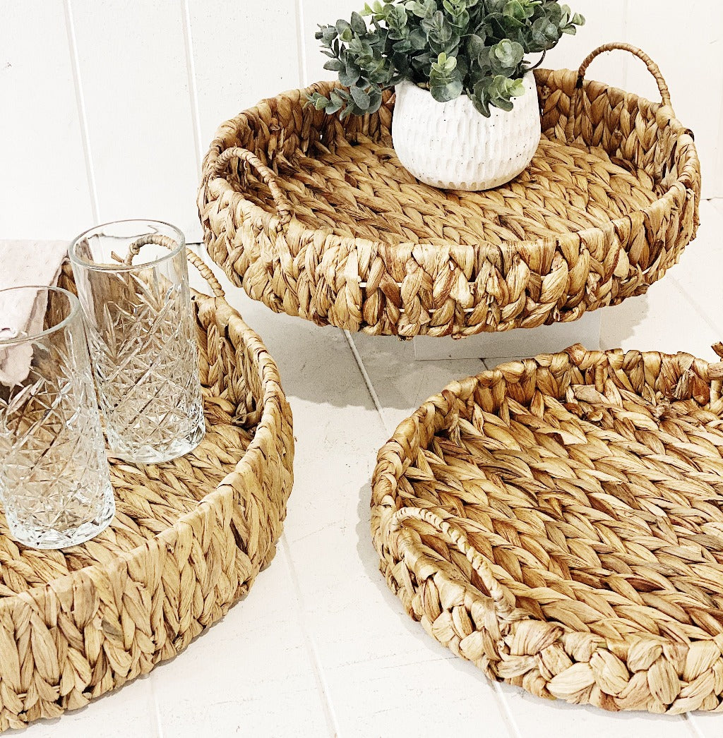 Complete your boho or coastal decor with our beautiful Water Hyacinth Basket with Handles which are perfect for adding a natural touch into your home or office. These natural hand woven baskets are a practical piece, perfect for storage. Available in three sizes.| Bliss Gifts &amp; Homewares | Unit 8, 259 Princes Hwy Ulladulla | South Coast NSW | Online Retail Gift &amp; Homeware Shopping | 0427795959, 44541523