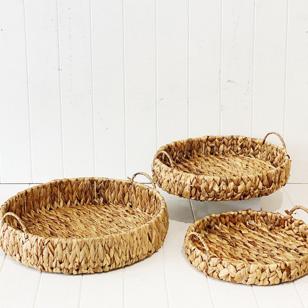 Complete your boho or coastal decor with our beautiful Water Hyacinth Basket with Handles which are perfect for adding a natural touch into your home or office. These natural hand woven baskets are a practical piece, perfect for storage. Available in three sizes.| Bliss Gifts &amp; Homewares | Unit 8, 259 Princes Hwy Ulladulla | South Coast NSW | Online Retail Gift &amp; Homeware Shopping | 0427795959, 44541523