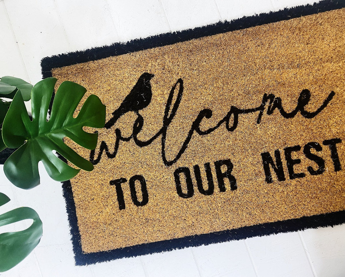 Our Welcome To Our Nest Door Mat is the perfect way to create a welcoming feel to your home before your guests even step foot inside with its beautiful design. Made from Natural coir fibres. PVC backing. Measures: 40x60x1.5cm.| Bliss Gifts &amp; Homewares | Unit 8, 259 Princes Hwy Ulladulla | South Coast NSW | Online Retail Gift &amp; Homeware Shopping | 0427795959, 44541523