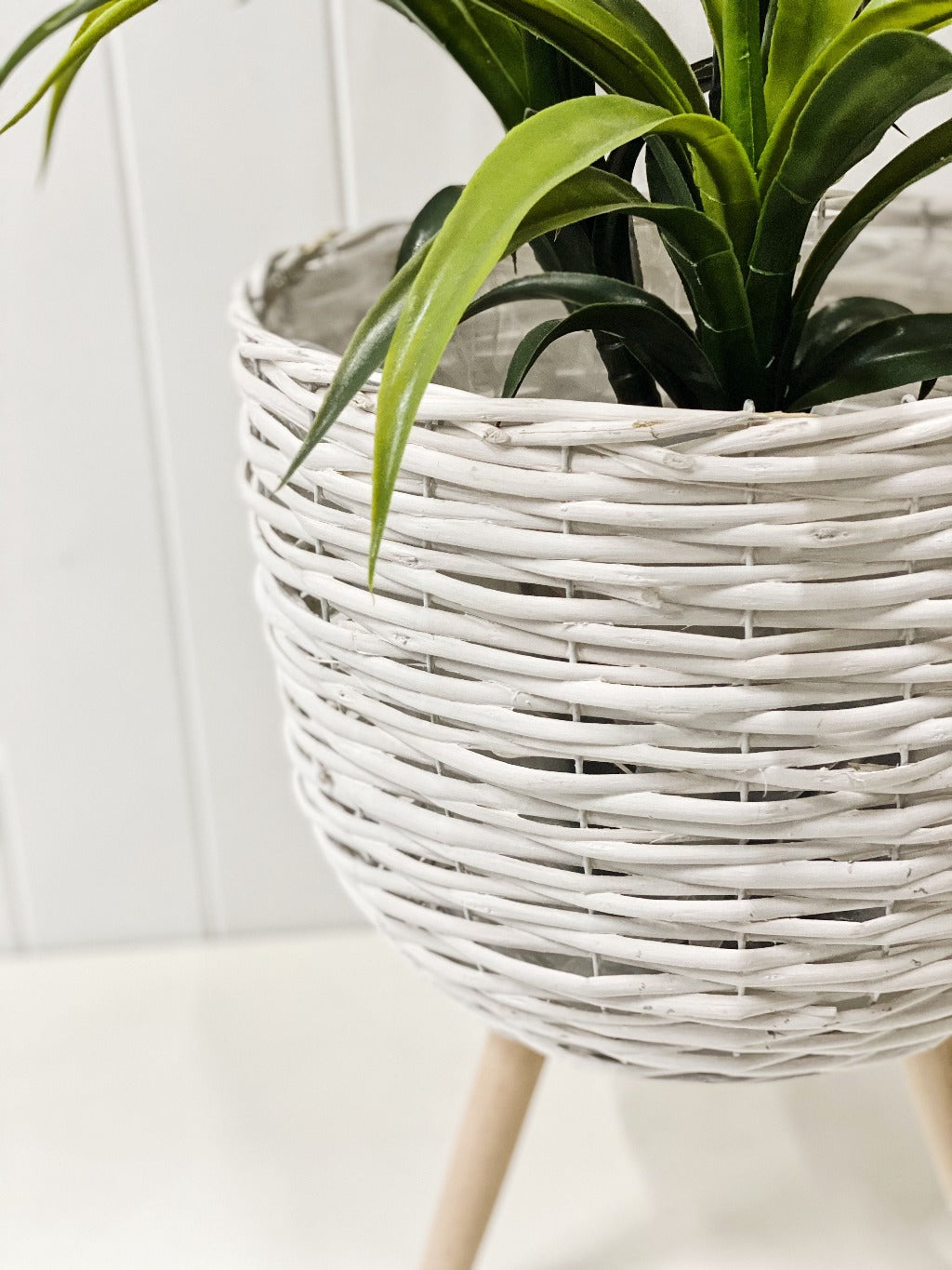 white wicker plant pot White Wicker Pot Holder with Timber Legs - Small | Indoor Planter