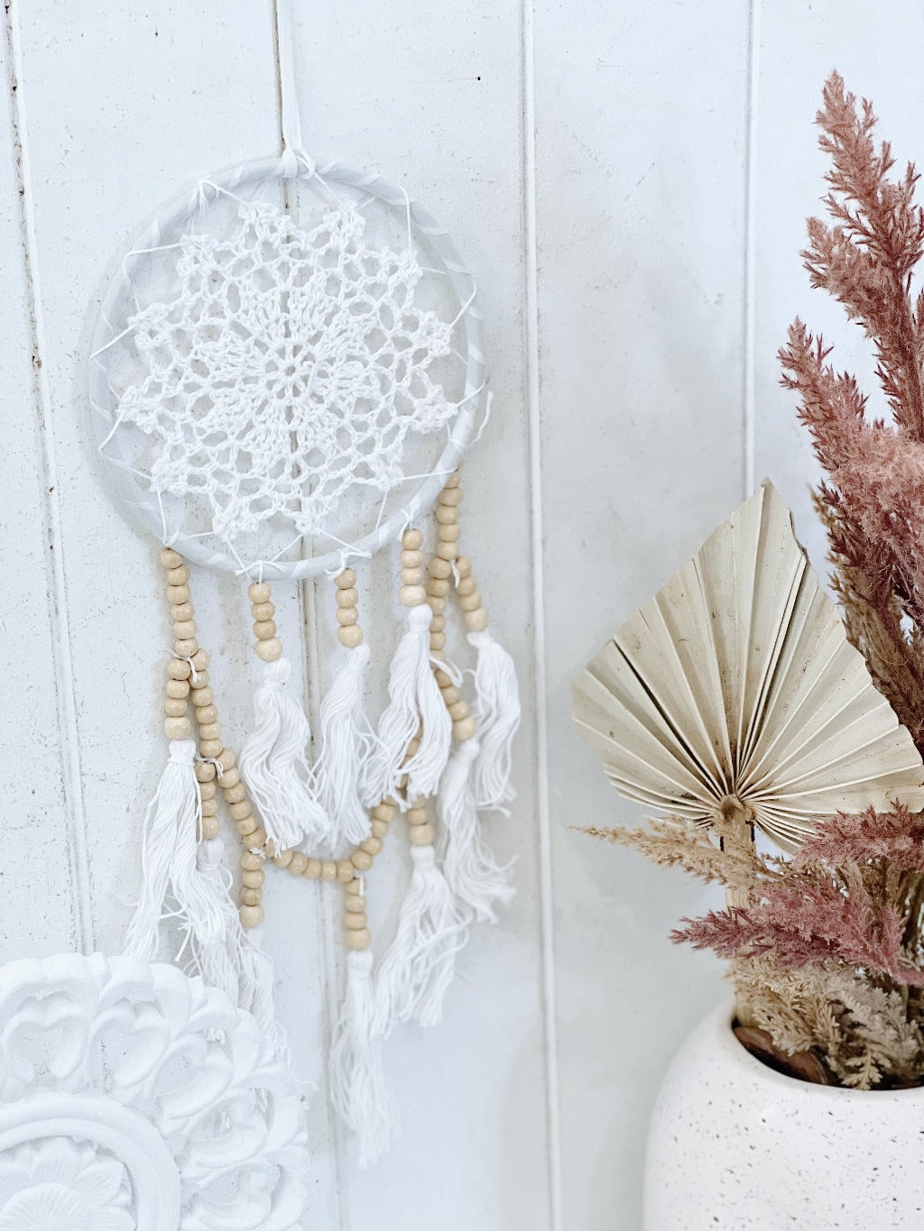 Bring bohemian style and a sense of comfort with a soothing colour palette and textures to your home with our beautiful crochet white Zara Dream Catcher. A Dream Catcher is thought to catch bad dreams and let only good dreams through to the dreamer below.