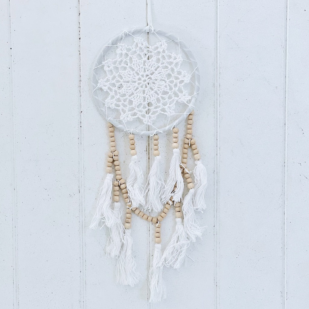 Bring bohemian style and a sense of comfort with a soothing colour palette and textures to your home with our beautiful crochet white Zara Dream Catcher. A Dream Catcher is thought to catch bad dreams and let only good dreams through to the dreamer below.