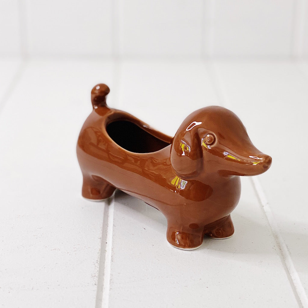 Liven up your home with our fun Dachshund Puppy Pot. Perfect for your favourite windowsill flower, or would make a fun and quirky way to store things. 16 x 5 x 8cm. BLISS Gifts &amp; Homewares - Online &amp; In-store. AfterPay now available | Bliss Gifts &amp; Homewares - Unit 8, 259 Princes Hwy Ulladulla - 0427795959, 44541523