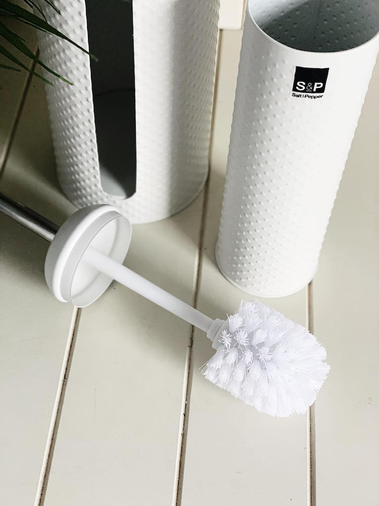 The SPOT Toilet Brush & Roll Holder features a beautiful white embossed
